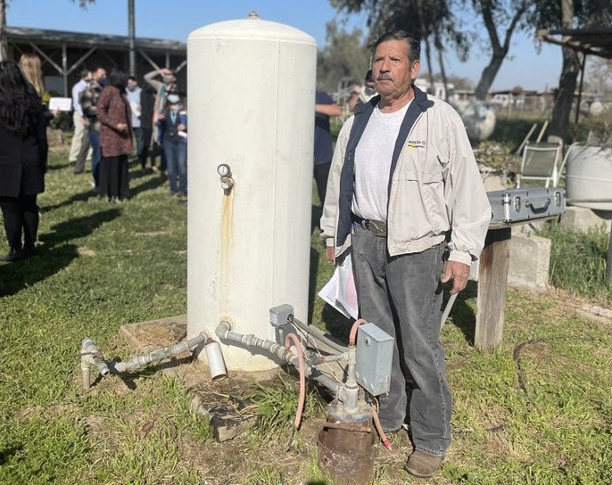 Community Water Tour in the San Joaquin Valley - Mr. Benitez next to his groundwater well